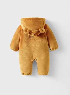 Wrap your little one in the warmth and charm of our Infant Baby Fleece Hooded Pooh Bear Jumpsuit Costume. This delightful jumpsuit features soft fleece material, complete with a hood that showcases Pooh Bear’s iconic ears and face. Perfect for Halloween, themed photoshoots, or simply keeping cozy on cooler days, this costume will make your baby look as sweet as honey. Bear Costume Baby, Care Bear Costume, Yellow Care Bear, Socks Photography, Jumpsuit Costume, Bodysuit And Skirt, Baby Boy Shirts, Bear Costume