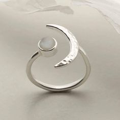 Our Sterling Silver Gemstone Moon Adjustable Ring is an enchanting piece and instant hit. This ring wraps beautifully around the finger, with a gemstone on one side and a hammered silver crescent on the other. Silver Adjustable Ring, Silversmith Rings, Sterling Silver Moonstone Ring, Ring Wraps, Silversmith Jewelry, Minimalist Silver Ring, Jewelry Stones