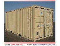 a large tan container sitting on top of a cement ground