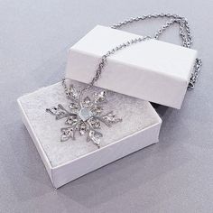 Stainless steel snowflake necklace with small jewels Silver Jewelry Christmas Gift For Her, Silver Clavicle Necklace For Christmas, Crystal Pendant Rhinestone Necklace As Gift, Crystal Rhinestone Pendant Necklace Gift, Silver Clavicle Chain Necklace For Christmas, Silver Necklace For Christmas Gift For Her, Silver Alloy Flower Pendant Necklace, Silver Alloy Necklace With Flower Pendant, Alloy Costume Jewelry Necklaces For Gifts