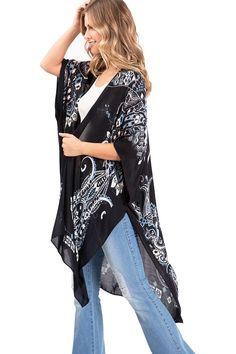 Printed lightweight cardigan, with split on sides and an open front style with an asymmetrical length. Dropped?sleeves and sheer fabric. Looks great layered over casual outfits. CARE | Hand Wash ColdCONTENTS | 100% ViscoseMEASUREMENTS | 38"/96 cm Top to Bottom (Size O/S) MODEL | 5'8 - wearing O/SIMPORTED Chic Spring Layering Cover-up, Casual Wrap Cardigan For Beach Cover-up, Casual Fall Cover-up With Kimono Sleeves, Casual Black V-neck Kimono, Summer Long Sleeve Lagenlook Cardigan, Black V-neck Cardigan For Vacation, Casual Open Front Beach Cover-up Outerwear, Spring Black Long Sleeve Cover-up, Casual Spring Cardigan With Asymmetrical Hem