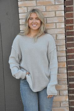 The Curvy Ribbed Knit Sweater Top in heather grey is a cozy and stylish staple, designed to provide both comfort and a flattering fit. The ribbed texture adds a subtle, sophisticated detail, while the heather grey color offers versatility for pairing with different outfits. This top is ideal for layering or wearing on its own, offering a relaxed yet polished look. Perfect for casual days or dressed up with accessories, the Curvy Ribbed Knit Sweater Top ensures you stay comfortable and stylish. Heather Grey Knit Sweater For Winter, Fall Knit Top With Ribbed Neckline For Everyday, Heather Grey Knit Long Sleeve Sweater, Cozy Fit Heather Grey Winter Sweater, Oversized Heather Grey Cozy Sweater, Heather Grey Long Sleeve Knit Sweater, Gray Ribbed Top For Fall, Gray Ribbed Sweater For Winter, Everyday Oversized Ribbed Sweater