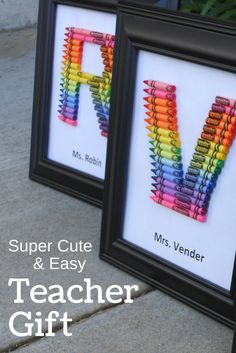 two framed pictures with crayons in the shape of letters