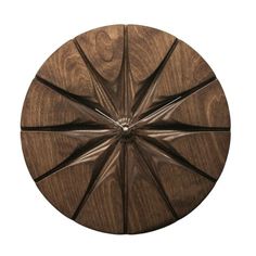 an image of a wooden wall clock with four spokes in the center on white background