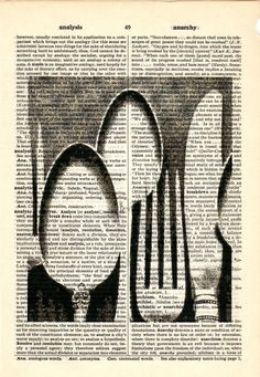 an old book page with spoons and forks