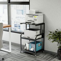 Enhance the functionality and organization of your workspace with the Portable Printer Stand. The reinforced metal frame gives this printer stand a modern industrial appearance. Three open storage shelves are suitable for holding printers, ink cartridges, and other office supplies. The printer storage stand with wheels have the flexibility of being movable, making this stand not only suitable for the office, but also a good choice for a kitchen cart when placed in the kitchen. Multi-purpose prin Printer Storage, Printer Cart, Mobile Printer, Printer Stands, Printer Stand, Modern Style Homes, Storage Stand, Sofa Side Table, Open Storage