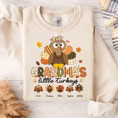 One Thankful Grandma Fall Thanksgiving Shirt,Personalized Thanksgiving Grandma Turkey Shirt,Turkey Nana Shirt, Custom Turkey Kidname Pumpkin ----------------------------------------------------------------- ** How to order? ** 1. Please check all pictures and choose your T-shirt Size and Color. 2. Choose your quantity as much as you want. 3. Please enter custom Design Color and Personalization Box (if applicable) 4. PLEASE secure all steps of your order 5. After You add your note, Please Click "Proceed to Checkout" After selecting the order, please check the address and parameters again. Product Details:✨  INFORMATION  We offer a variety of shirts: * Adult Unisex Tee: 5.3-ounce, 100% cotton (99/1 cotton/poly (Ash) & 90/10 cotton/poly (Sport Grey), 50/50 cotton/poly (Dark Heather) Made with Cute Thanksgiving Shirts, Nana Shirts Ideas, Elf T Shirt, Nana Shirts, Turkey Shirts, Thanksgiving Shirts, Toddler Tees, Fall Thanksgiving, Pocket Pouch