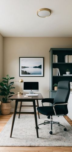 an office with a desk, chair and bookshelf in the corner is shown