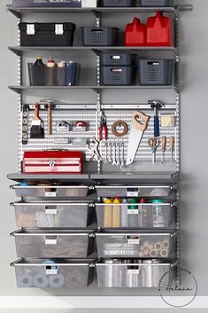 the shelves are organized with bins, tools and other things to keep in place