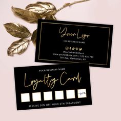 two business cards with gold foil leaves on the front and back, one is black