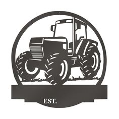 a black and white photo of a tractor in a circle with the words est on it