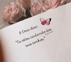 pink roses in a white box with a poem written on it