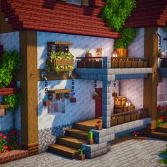 a very nice looking house with lots of plants on the roof and stairs to it