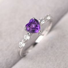 Fine Jewelry Amethyst Ring Heart Cut, Fine Jewelry Heart Cut Amethyst Ring, Elegant Purple Heart Ring For Anniversary, Elegant Purple Heart Promise Ring, Amethyst Round Cut Birthstone Ring For Anniversary, Amethyst Birthstone Ring With Round Cut For Anniversary, White Gold Amethyst Ring With Cubic Zirconia For Gift, Purple Heart Ring For Promise, Fine Jewelry, Purple Heart Ring With Accent Stones For Anniversary