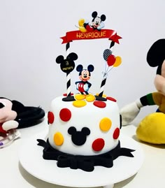 there is a cake with mickey mouse on it