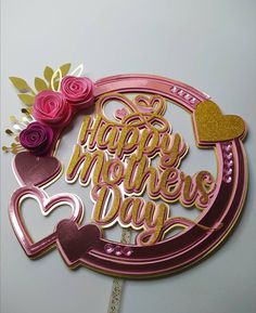 a happy mother's day cutout with flowers and hearts on it is shown