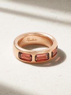 Pomellato's 'Iconica' collection celebrates Milan's rich jewelry making heritage. Handmade from 18-karat rose gold, this ring is set with a trio of glowing Pyrope garnets. Wear yours solo or stacked alongside the peridot or topaz versions in our edit. Formal 14k Rose Gold Jewelry With Bezel Setting, Rose Gold Baguette Cut Jewelry For Formal Occasions, Elegant Faceted Rose Gold Rings, Formal Faceted Rose Gold Rings, Refined Rose Gold Promise Ring Jewelry, Pink Gold Jewelry With Bezel Setting For Formal Occasions, Modern Rose Gold Rings For Everyday Wear, Modern Rose Gold Rings For Everyday Luxury, Pink Gold Formal Jewelry With Bezel Setting