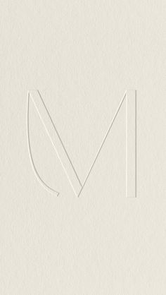 the letter m is drawn in white paper