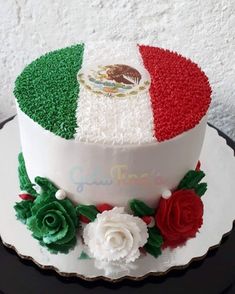 a cake decorated with the flag of mexico