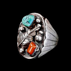 Natural Red Coral, Turquoise Nugget and Silver Leaves. Circa 1960s. Excellent silver work, in very good condition. This is a collectable mid century ring !  Size 10 1/2  Measures 1 1/4" tall  Weight 28.6 grams https://farriderwest.etsy.com/listing/1712616606  Available at Far-Rider-West.com    #etsystore #westernjewelry #cowboy #turquoisering #nativeamerican #indianjewelry #sterlingsilverring #wildwest #oldpawn #silvermensring #chunkysilverring #handmadeartisan #uniquering Chunky Silver Rings, Silver Leaves, Native American Turquoise, American Turquoise