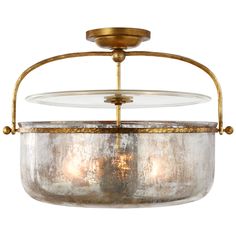 a light fixture with two glass bowls hanging from it's center and one light on the