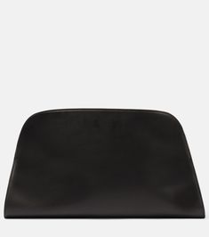 EW Margaux leather clutch in black - The Row | Mytheresa Designer Black Clutch With Zipper Closure, Designer Black Leather Pouch, Black Leather-lined Pouch Clutch, Modern Black Clutch In Soft Leather, Designer Textured Leather Clutch For Business, Black Travel Clutch With Dust Bag Included, Designer Textured Leather Business Clutch, Black Leather Formal Pouch, Modern Black Soft Leather Clutch