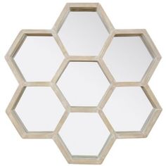 a mirror that is shaped like hexagons