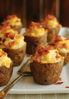 baked potato cups with bacon and cheese on a white plate