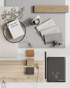 an overhead view of various items on the floor, including books and papers with flowers