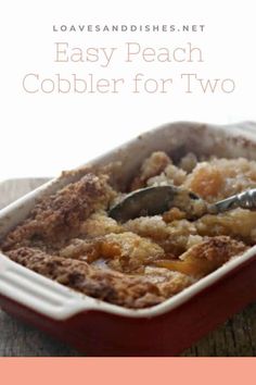 an easy peach cobbler for two in a casserole dish with a serving spoon