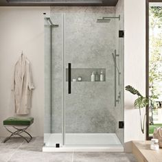 a bathroom with a walk in shower next to a bench and potted plant on the floor