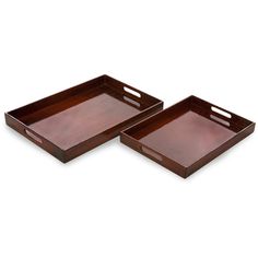 two wooden trays sitting on top of each other