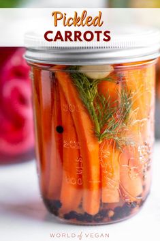 pickled carrots in a mason jar with text overlay