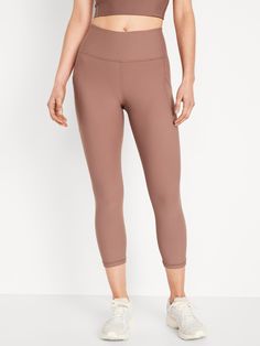 elasticized waistband hip pockets go-dry wicks moisture sits at belly button fitted hip and thigh hits mid-calf 21" regular inseam 19" petite inseam 24" tall inseam models are approx.  5'9" and wear sizes s (4), l (12), and xl (18)machine wash according to the care instruction label Perfect Leggings, Crop Leggings, Old Navy Women, Bottom Clothes, Big And Tall, Petite Size, Wicks, Belly Button, Cropped Leggings