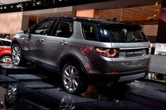 a range rover is on display at an auto show