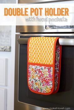 a pot holder hanging from the side of an oven door with text overlay that reads, double pot holder with hand pockets