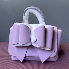 Brand Grossi Lavender Crossbody Trendy Purple Pouch Satchel, Purple Rectangular Bags With Adjustable Handle, Spring Purple Satchel Shoulder Bag, Trendy Purple Bags For Shopping, Trendy Purple Shopping Bag, Purple Bags With Adjustable Strap For Spring, Purple Crossbody Shoulder Bag With Detachable Handle, Purple Spring Bag With Adjustable Strap, Purple Detachable Handle Crossbody Shoulder Bag