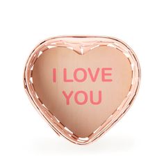 a heart shaped object with the words i love you written on it's side