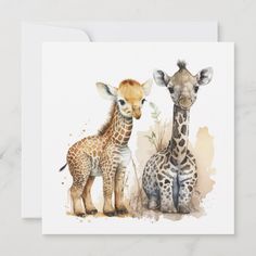 two giraffes standing next to each other on a white card with watercolor paint