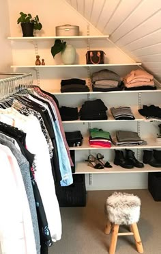 the closet is full of clothes, shoes and other things to wear in it for storage