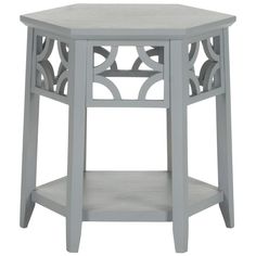 a grey side table with an intricate design on the top and bottom shelf, against a white background