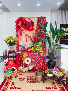 a room filled with lots of decorations and plants