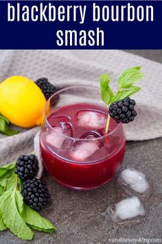 blackberry bourbon smash with lemon and mint garnish