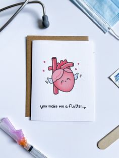 a card with an illustration of a heart and the words you make me a flutterer