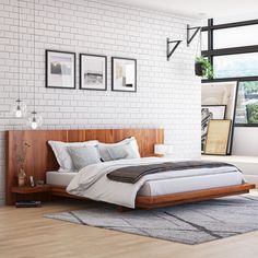 a bedroom with white brick walls and wooden bed frames on the wall, along with a gray area rug