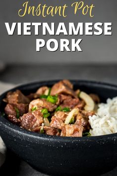 a bowl filled with meat and rice on top of a table