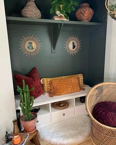 a room filled with lots of furniture and plants on top of it's shelves