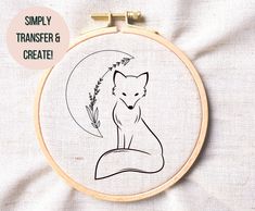 the embroidery pattern shows a fox sitting on its hind legs