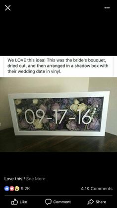 a sign that says we love this idea was the bride's bouquet, dried out, and then arranged in shadow box with their wedding date in vinyl