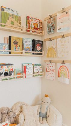 Kid Room Wall Storage, Toy Room Book Shelves, Kids Bedroom Book Storage, Shelving Ideas For Playroom, Kids Display Shelves, Children’s Art Display, Toddler Art Display Ideas, Space Saving Classroom Ideas, Playroom Art Storage